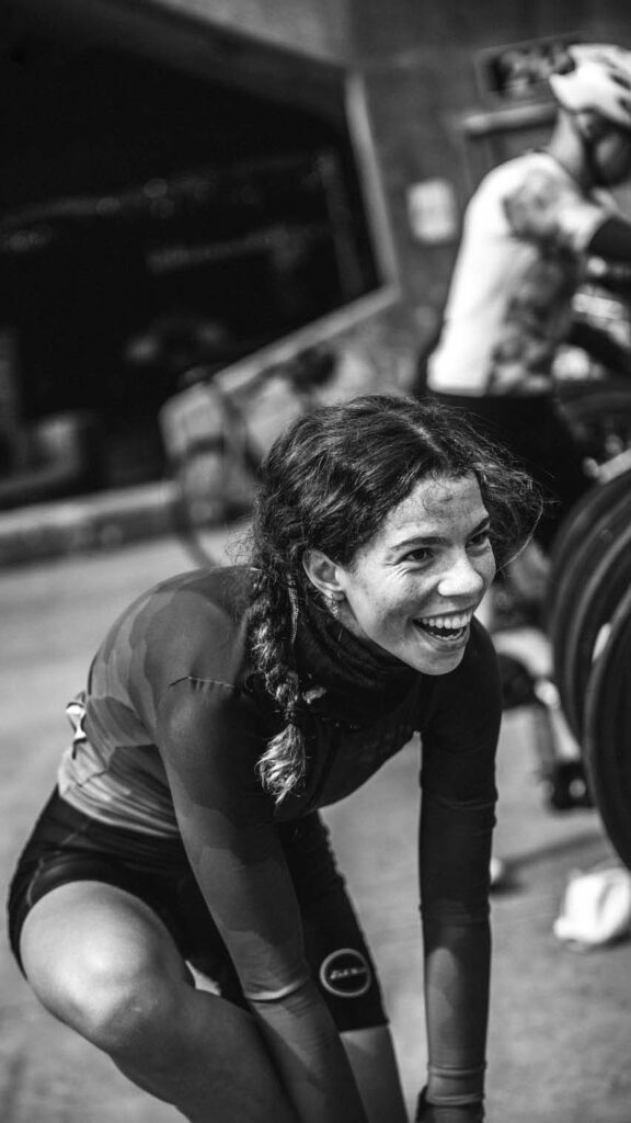 7 copy A smiling cycling race participant photographed in black and white