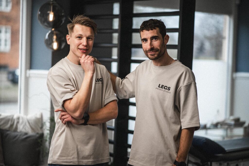 Two staff members at their workplace