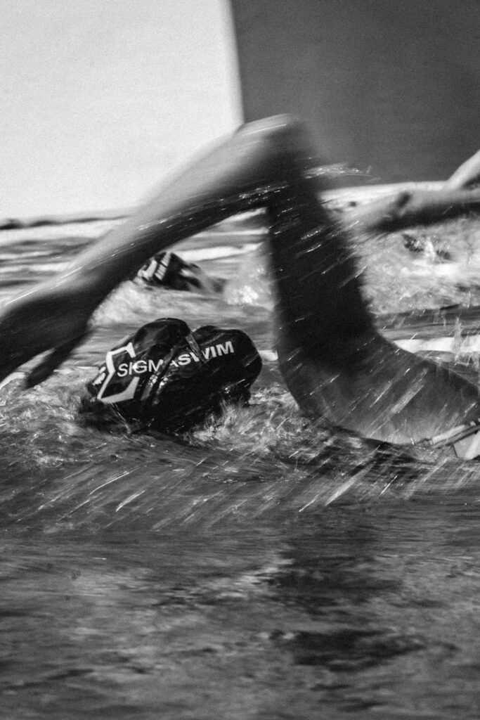 HAL02249INSTA A swimmer in the water photographed in black and white