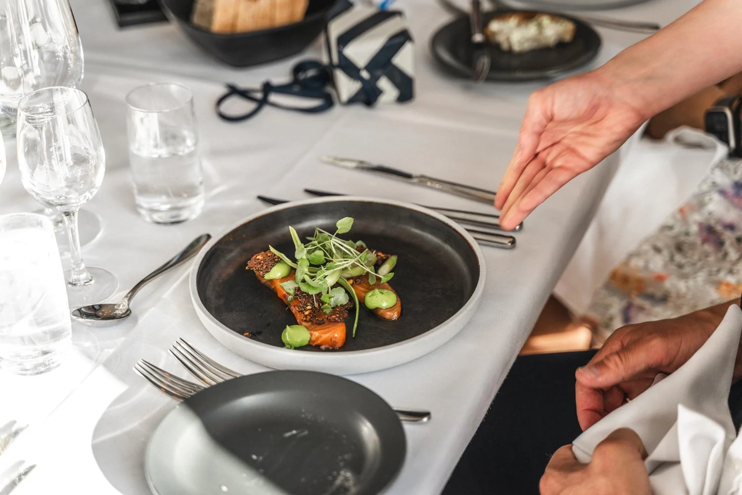 A plate of food being served at a celebration table