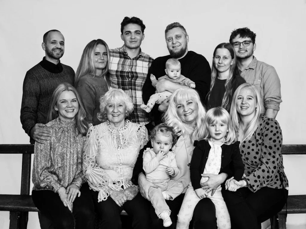 Large family portrait with children and adults in black and white Large family portrait with children and adults in black and white